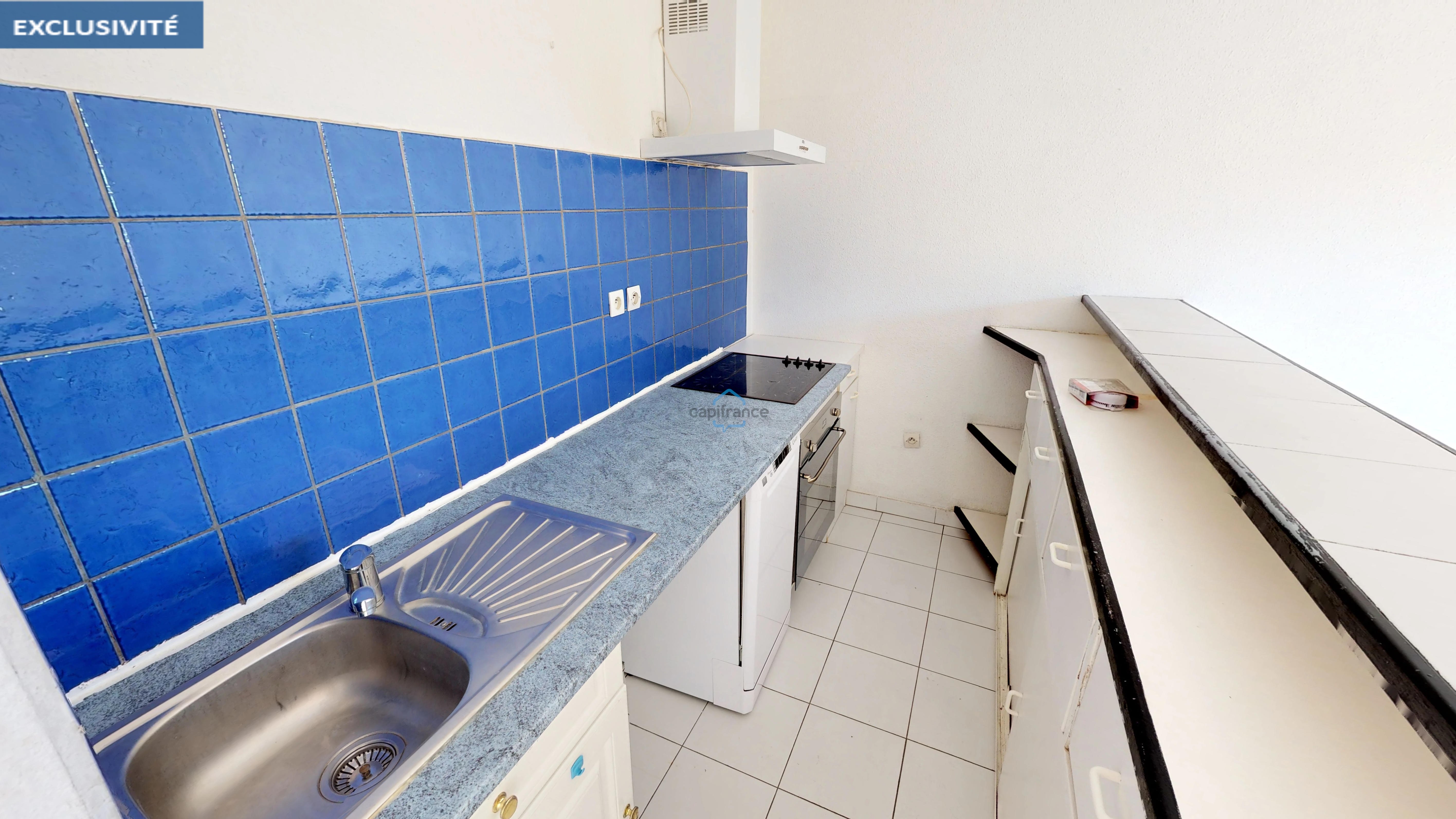 Dpt Hérault (34), à vendre LUNEL appartement T2 de 48 m² avec parking